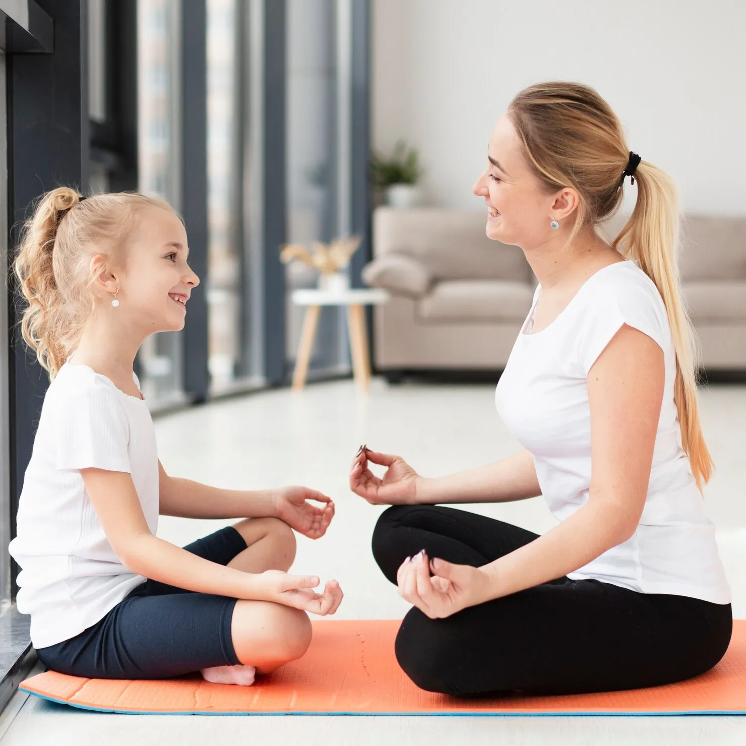 side-view-mother-daughter-doing-yoga-pose-home_23-2148492462_MH9N